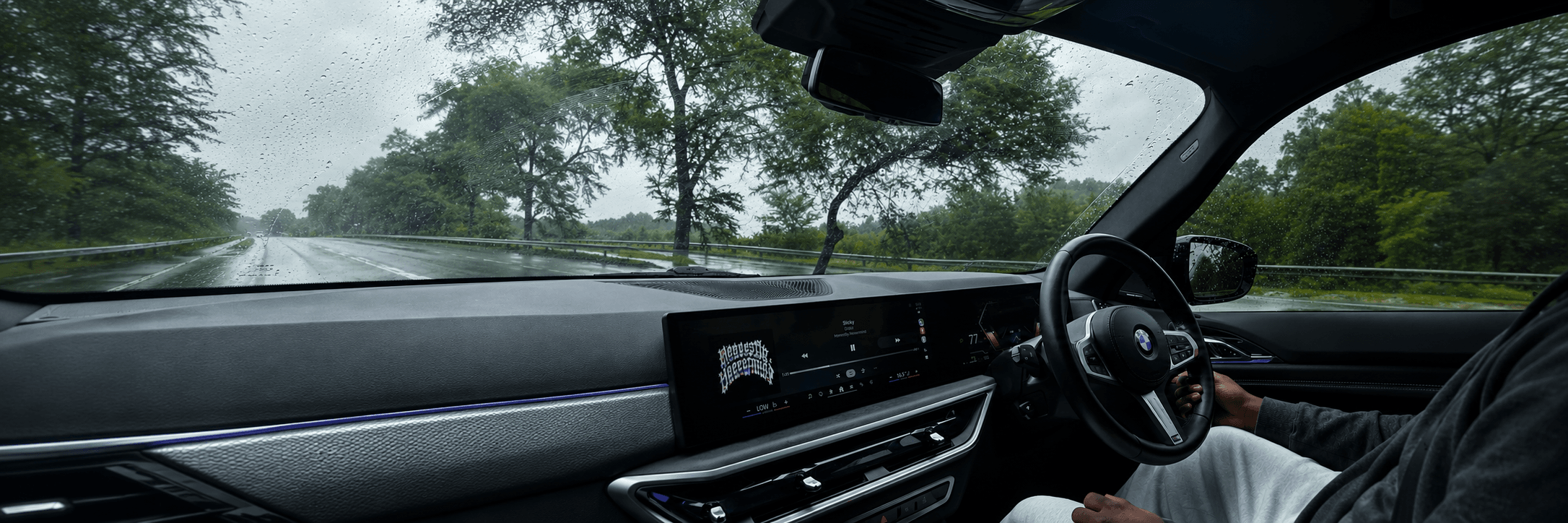 The dashboard and steering wheel inside a premium vehicle
